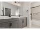 Modern bathroom with double vanity and walk-in shower at 28225 N 65Th Ln, Phoenix, AZ 85083