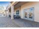 Covered patio with seating area and brick flooring at 28225 N 65Th Ln, Phoenix, AZ 85083