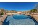 Inviting swimming pool with waterfall feature and spacious patio area at 28225 N 65Th Ln, Phoenix, AZ 85083