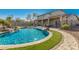 Resort style pool with a waterfall and lush landscaping at 28225 N 65Th Ln, Phoenix, AZ 85083