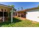 Backyard with covered patio and grassy area at 2825 N 33Rd Pl, Phoenix, AZ 85008