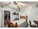 Small bedroom with a twin bed, desk, and built-in closet at 2825 N 33Rd Pl, Phoenix, AZ 85008