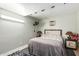 Small bedroom with double bed, nightstands, and ceiling fan at 2825 N 33Rd Pl, Phoenix, AZ 85008