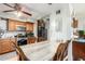 Bright kitchen with wood cabinets, gas range, and patterned backsplash at 2825 N 33Rd Pl, Phoenix, AZ 85008