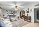 Open living space with grey sofas and view into kitchen at 2825 N 33Rd Pl, Phoenix, AZ 85008