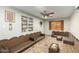 Living room featuring low seating and built-in shelving at 2825 N 33Rd Pl, Phoenix, AZ 85008