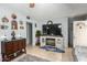 Living room with eclectic decor and built-in shelving at 2825 N 33Rd Pl, Phoenix, AZ 85008