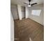 Bright bedroom with ceiling fan, closet, and carpeted floors at 2826 E Augusta Ave, Chandler, AZ 85249