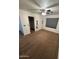 Main bedroom with ceiling fan, window coverings, and mirrored closet doors at 2826 E Augusta Ave, Chandler, AZ 85249