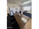 Kitchen with a butcher block island and stainless steel appliances at 2826 E Augusta Ave, Chandler, AZ 85249