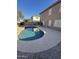 Inviting kidney shaped pool with surrounding patio and pebble texture at 2826 E Augusta Ave, Chandler, AZ 85249