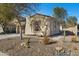 Front view of single-story home with gravel landscaping at 29798 N 121St Dr, Peoria, AZ 85383