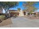 Single-story home with desert landscaping and two-car garage at 29798 N 121St Dr, Peoria, AZ 85383