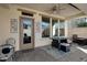 Covered patio with seating area and ceiling fan at 29798 N 121St Dr, Peoria, AZ 85383