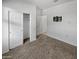 Bedroom with closet and carpeted floor at 30734 W Clarendon Ave, Buckeye, AZ 85396