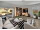 Living room with patio access and built-in shelving at 30734 W Clarendon Ave, Buckeye, AZ 85396