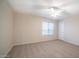 Bright bedroom with neutral walls and carpet at 30788 N Whirlaway Trl, San Tan Valley, AZ 85143