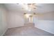 Spacious bedroom with ceiling fan and carpet at 30788 N Whirlaway Trl, San Tan Valley, AZ 85143