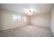 Spacious bedroom with neutral walls and carpet at 30788 N Whirlaway Trl, San Tan Valley, AZ 85143