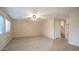 Living room with carpeted floors and neutral wall colors at 30788 N Whirlaway Trl, San Tan Valley, AZ 85143