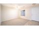 Living room with carpeted floors and neutral wall colors at 30788 N Whirlaway Trl, San Tan Valley, AZ 85143