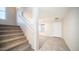 Staircase leading to the second floor of the home at 30788 N Whirlaway Trl, San Tan Valley, AZ 85143