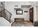 Inviting entryway with wooden bench and staircase at 3247 E Silverwood Dr, Phoenix, AZ 85048