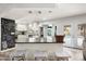 Kitchen with island, chalkboard accent wall, and pool view at 3247 E Silverwood Dr, Phoenix, AZ 85048