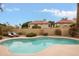 Relaxing kidney-shaped pool and spa in the backyard at 3247 E Silverwood Dr, Phoenix, AZ 85048