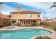 Relaxing backyard with a kidney-shaped pool, patio, and putting green at 3247 E Silverwood Dr, Phoenix, AZ 85048