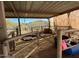 Covered area with horse stalls and desert landscape at 42213 N 3Rd St, Phoenix, AZ 85086