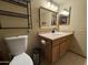 Clean bathroom with vanity, toilet and shower at 42213 N 3Rd St, Phoenix, AZ 85086