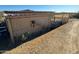 Exterior view of a chicken coop in a desert setting at 42213 N 3Rd St, Phoenix, AZ 85086