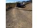 Gravel driveway leading to a property with mountain views at 42213 N 3Rd St, Phoenix, AZ 85086