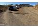 Gravel driveway leading to a property with mountain views at 42213 N 3Rd St, Phoenix, AZ 85086