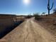 Desert landscape with a long gravel driveway at 42213 N 3Rd St, Phoenix, AZ 85086