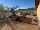 Elevated garden bed with mountain backdrop, offering a space for cultivation at 42213 N 3Rd St, Phoenix, AZ 85086