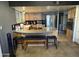 Fully-equipped kitchen with breakfast bar, stainless steel appliances, and ample storage at 42213 N 3Rd St, Phoenix, AZ 85086