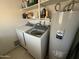 Functional laundry room with storage at 42213 N 3Rd St, Phoenix, AZ 85086