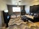 Cozy living room features a wood burning stove, plush seating, and neutral decor at 42213 N 3Rd St, Phoenix, AZ 85086