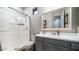 Bathroom with walk-in shower and gray vanity at 4377 E Leroy St, Gilbert, AZ 85295