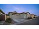 Exterior view of home with two-car garage at 4377 E Leroy St, Gilbert, AZ 85295