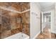 Bathroom featuring a tiled shower and a neutral color palette at 4525 E Calle Ventura --, Phoenix, AZ 85018