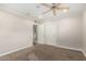 Bedroom with gray carpet and white closet doors at 4525 E Calle Ventura --, Phoenix, AZ 85018