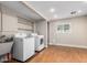 Bright laundry room with modern washer, dryer, and built in storage at 4525 E Calle Ventura --, Phoenix, AZ 85018