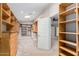 Spacious walk-in closet with custom shelving and drawers for optimal storage at 4525 E Calle Ventura --, Phoenix, AZ 85018