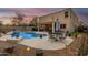 Inviting backyard oasis with a sparkling pool and patio furniture at 4547 E Sodalite St, San Tan Valley, AZ 85143