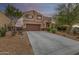 Two-story house with brown accents and driveway at 4547 E Sodalite St, San Tan Valley, AZ 85143