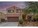 Two-story house with brown accents and landscaped yard at 4547 E Sodalite St, San Tan Valley, AZ 85143