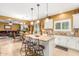 Modern kitchen with white cabinets and granite countertops at 4547 E Sodalite St, San Tan Valley, AZ 85143